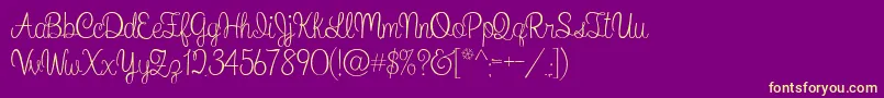 WhatIWantForChristmas Font – Yellow Fonts on Purple Background