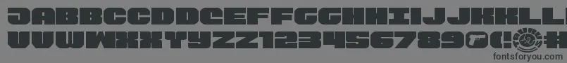 フォントTauroexpand11 – 黒い文字の灰色の背景