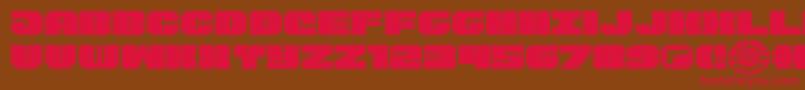 フォントTauroexpand11 – 赤い文字が茶色の背景にあります。