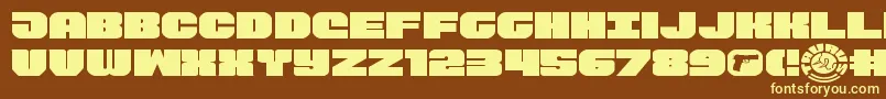 Tauroexpand11-fontti – keltaiset fontit ruskealla taustalla