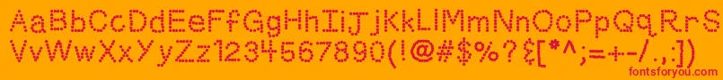 Kbskittled-Schriftart – Rote Schriften auf orangefarbenem Hintergrund