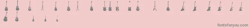 フォントJazzedUp – ピンクの背景に灰色の文字