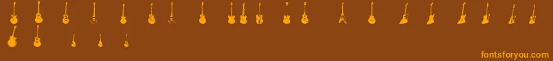 フォントJazzedUp – オレンジ色の文字が茶色の背景にあります。
