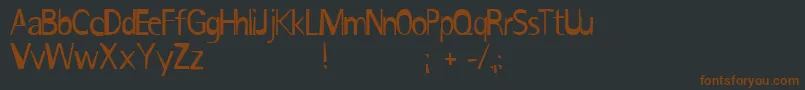 IronikRotis Font – Brown Fonts on Black Background