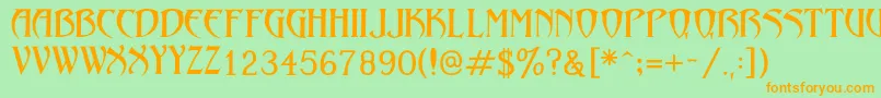 フォントLezvieKk – オレンジの文字が緑の背景にあります。