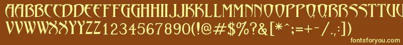 フォントLezvieKk – 黄色のフォント、茶色の背景