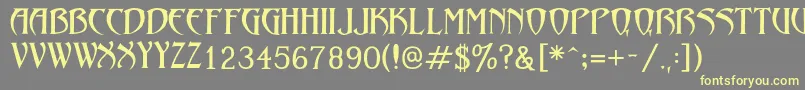 フォントLezvieKk – 黄色のフォント、灰色の背景