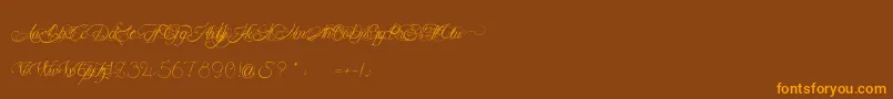 MademoiselleCamille Font – Orange Fonts on Brown Background