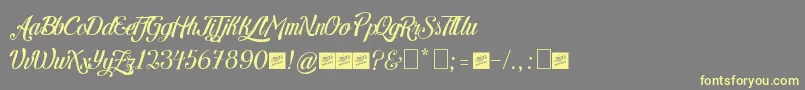LetraHipsterPersonalUseByJuanCasco Font – Yellow Fonts on Gray Background