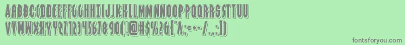 Weitere Informationen zur Grendelsmotherpunch-Schriftart Grendelsmotherpunch-Schriftart – Graue Schriften auf grünem Hintergrund