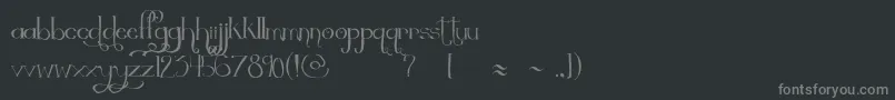 フォントThequickest – 黒い背景に灰色の文字