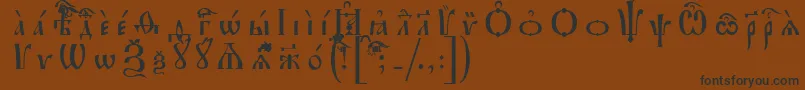 フォントIrmologionIeucsSpacedout – 黒い文字が茶色の背景にあります