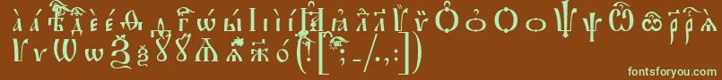 フォントIrmologionIeucsSpacedout – 緑色の文字が茶色の背景にあります。