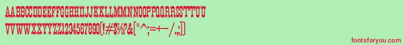 K22EurekaNofrills-fontti – punaiset fontit vihreällä taustalla