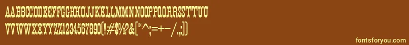 K22EurekaNofrills-fontti – keltaiset fontit ruskealla taustalla