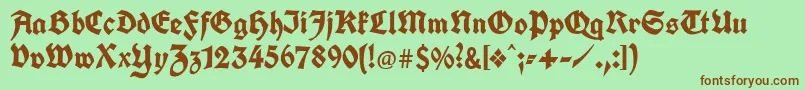 Unifrakturcook Font – Brown Fonts on Green Background