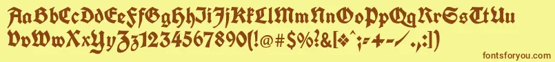 Unifrakturcook-Schriftart – Braune Schriften auf gelbem Hintergrund