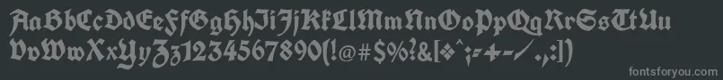 フォントUnifrakturcook – 黒い背景に灰色の文字