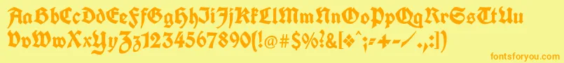 フォントUnifrakturcook – オレンジの文字が黄色の背景にあります。