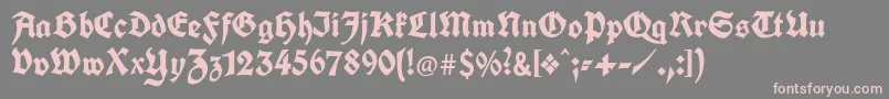 Шрифт Unifrakturcook – розовые шрифты на сером фоне