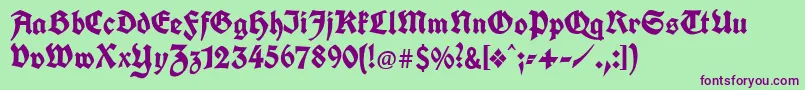 Unifrakturcook-fontti – violetit fontit vihreällä taustalla