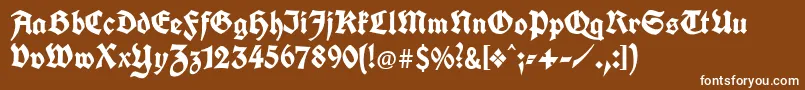 Unifrakturcook-fontti – valkoiset fontit ruskealla taustalla