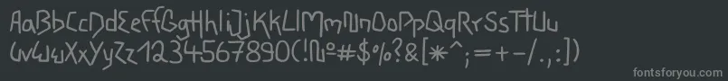 フォントWacky – 黒い背景に灰色の文字