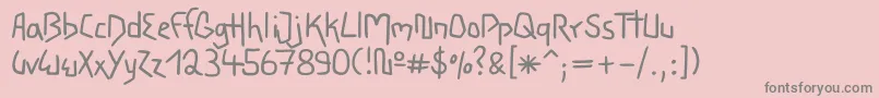 フォントWacky – ピンクの背景に灰色の文字