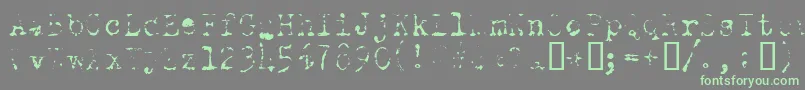 OldTypewriterSkimpy-Schriftart – Grüne Schriften auf grauem Hintergrund