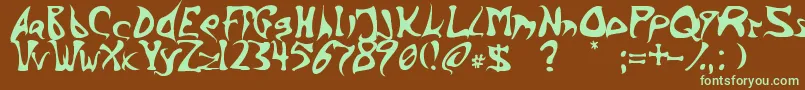 フォントBarbink – 緑色の文字が茶色の背景にあります。