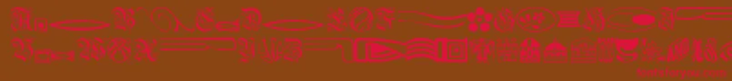 フォントElegantDings – 赤い文字が茶色の背景にあります。