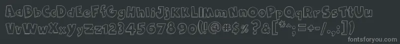 Cartoon2Us-fontti – harmaat kirjasimet mustalla taustalla