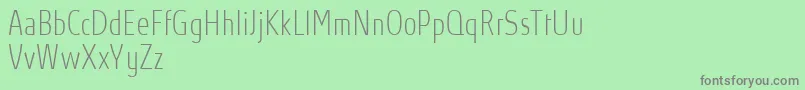 Fonte AbsolutProThincondensed – fontes cinzas em um fundo verde