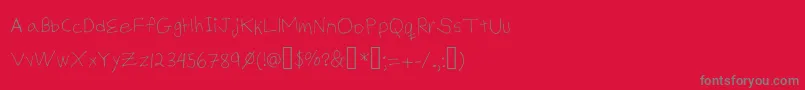 フォントBillysHandThin – 赤い背景に灰色の文字