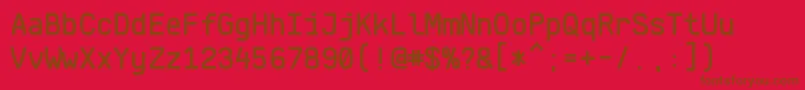 KlartextMonoMedium-fontti – ruskeat fontit punaisella taustalla
