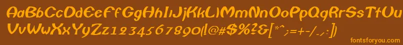 ColumboItalic-fontti – oranssit fontit ruskealla taustalla