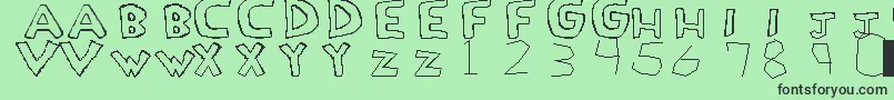 フォントLoveDrug – 緑の背景に黒い文字