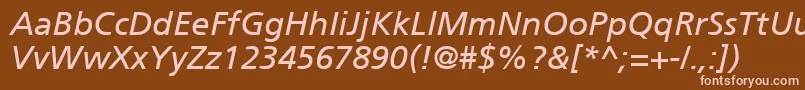フォントForeignerItalic – 茶色の背景にピンクのフォント