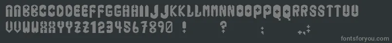 Iphis-fontti – harmaat kirjasimet mustalla taustalla