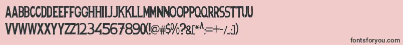 フォントSpanishstencil – ピンクの背景に黒い文字