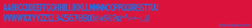 フォントSpanishstencil – 赤い背景に青い文字