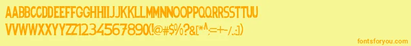フォントSpanishstencil – オレンジの文字が黄色の背景にあります。