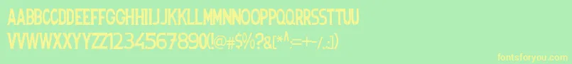 フォントSpanishstencil – 黄色の文字が緑の背景にあります