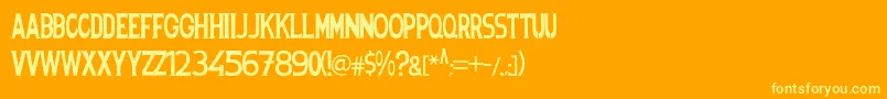 Шрифт Spanishstencil – жёлтые шрифты на оранжевом фоне