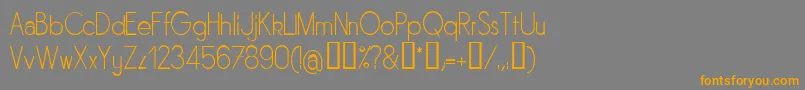 フォントSornl – オレンジの文字は灰色の背景にあります。