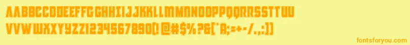 フォントAntillesacad – オレンジの文字が黄色の背景にあります。