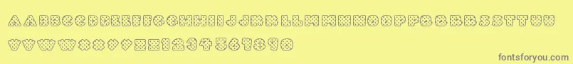 FattyHeartFilled-Schriftart – Graue Schriften auf gelbem Hintergrund