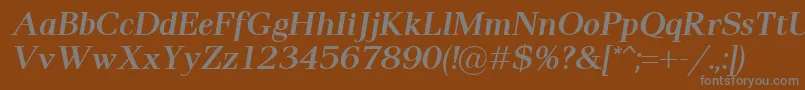 Pax2SemiboldItalic-Schriftart – Graue Schriften auf braunem Hintergrund
