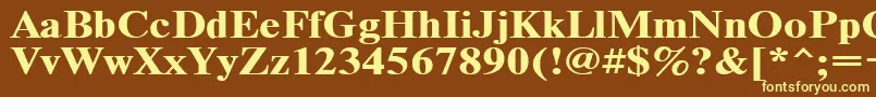 Timeset120b-fontti – keltaiset fontit ruskealla taustalla