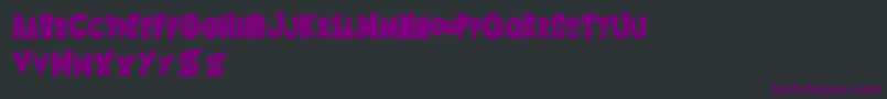 Czcionka SaiyanSansRightOblique – fioletowe czcionki na czarnym tle